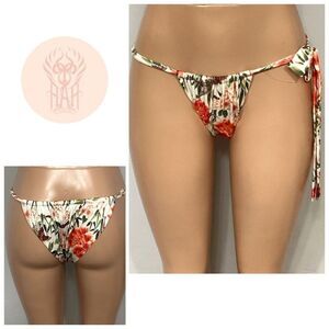 New. HOT AS HELL floral bikini bottom. NSRP $98. Small